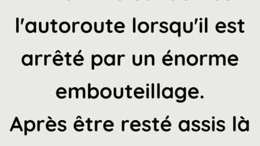 Un homme conduit sur l'autoroute.