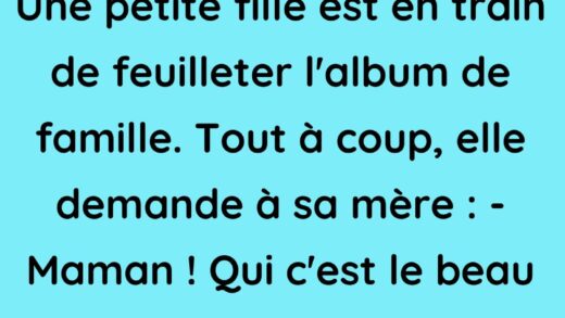 Une petite fille est en train de feuilleter l'album de famille